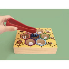 Jeu de motricité fine en bois – Attraper les abeilles avec une pince